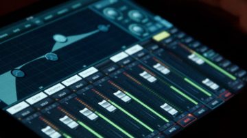 tracking-shot-of-men-and-woman-sitting-at-table-in-dimly-lit-living-room-and-talkin-SBV-346670272-4K.00_00_28_02.Still006-768x432